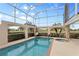 Inviting screened pool and spa with golf course views at 418 Cardiff Rd, Venice, FL 34293