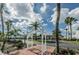 Brick pathway with white archway entrance to Paradise Shores community at 5216 81St N St # 3, St Petersburg, FL 33709