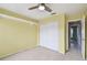 Bedroom with double closet and access to hallway at 11222 Moonvalley Way, Tampa, FL 33635