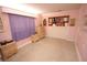 Simple bedroom with neutral walls and built-in shelving at 2910 W Comanche Ave, Tampa, FL 33614