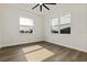 Well-lit bedroom featuring hardwood floors and dual windows at 4501 21St N St, St Petersburg, FL 33714