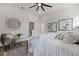 Bright bedroom with a queen-size bed and wood floors at 4501 21St N St, St Petersburg, FL 33714