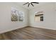 Bright bedroom featuring wood-look floors and large windows at 4501 21St N St, St Petersburg, FL 33714