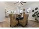 Bright dining room with a glass-top table and woven chairs at 4501 21St N St, St Petersburg, FL 33714
