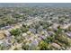 Wide aerial view of houses and the neighborhood at 8416 N Semmes St, Tampa, FL 33604