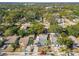 Aerial view of a house and surrounding neighborhood at 8416 N Semmes St, Tampa, FL 33604