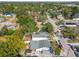 High-angle view of a house with a yard and neighboring homes at 8416 N Semmes St, Tampa, FL 33604