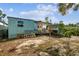 Backyard with a small shed and an unkempt area at 8416 N Semmes St, Tampa, FL 33604
