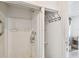 Small bathroom with shower stall and adjacent storage closet at 8416 N Semmes St, Tampa, FL 33604