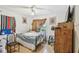 Bedroom with double bed and dresser at 8416 N Semmes St, Tampa, FL 33604