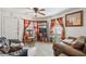 Living Room with brown couches and a TV at 8416 N Semmes St, Tampa, FL 33604