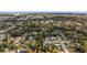 An overview of a neighborhood featuring tree-covered streets and neatly arranged homes at 10206 Lola St, Tampa, FL 33612