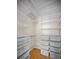 Large closet with wire shelving and drawers for storage at 1669 Fry Ct, Dunedin, FL 34698