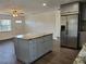 Modern kitchen with a large island and stainless steel appliances at 1705 51St Street S, Gulfport, FL 33707