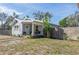 This single-Gathering home is designed with a classic front porch and a well-maintained lawn at 420 40Th N St, St Petersburg, FL 33713