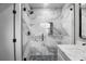 Modern bathroom with marble tile and glass shower at 6602 S Emerson Ave, St Petersburg, FL 33707