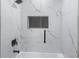 Modern bathroom with marble tile and glass shower at 6602 S Emerson Ave, St Petersburg, FL 33707