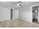 Spacious bedroom with double doors leading to closet and bathroom at 6602 S Emerson Ave, St Petersburg, FL 33707
