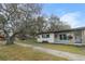 Charming ranch home with mature trees and curb appeal at 6602 S Emerson Ave, St Petersburg, FL 33707