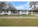 Newly renovated home with a modern facade and landscaped yard at 6602 S Emerson Ave, St Petersburg, FL 33707