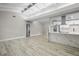 Modern kitchen with marble island and stainless steel appliances at 6602 S Emerson Ave, St Petersburg, FL 33707