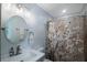 Clean bathroom with updated vanity and shower at 1009 Black Knight Dr, Valrico, FL 33594
