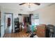 Bright bedroom with wood floors and ample closet space at 1009 Black Knight Dr, Valrico, FL 33594
