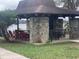 Outdoor pavilion with picnic tables and grills, perfect for community gatherings at 1009 Black Knight Dr, Valrico, FL 33594