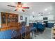 Dining room with wooden table and kitchen view at 1009 Black Knight Dr, Valrico, FL 33594