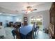 Bright dining room with view into living room at 1009 Black Knight Dr, Valrico, FL 33594