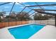 Inviting screened-in pool with a large backyard at 1009 Black Knight Dr, Valrico, FL 33594