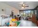 Versatile sunroom with space for a home office and play area at 1009 Black Knight Dr, Valrico, FL 33594
