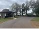 Waterfront view with pavilion and paved pathway at 1009 Black Knight Dr, Valrico, FL 33594