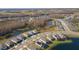 Aerial view of houses and community with lakes at 19494 Sea Glass Cir, Land O Lakes, FL 34638