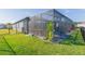 Private backyard oasis with screened enclosure at 19494 Sea Glass Cir, Land O Lakes, FL 34638