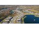 Expansive community view showcasing numerous homes and lakes at 19494 Sea Glass Cir, Land O Lakes, FL 34638