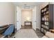 View of an office with double doors opening to another room at 19494 Sea Glass Cir, Land O Lakes, FL 34638