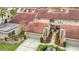 Community view showing multiple units and landscaping at 3076 Braeloch E Cir # 5, Clearwater, FL 33761