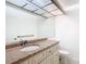 Updated bathroom with granite vanity and tiled floors at 3076 Braeloch E Cir # 5, Clearwater, FL 33761