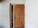 Ornate wood front door adds character to the home at 3076 Braeloch E Cir # 5, Clearwater, FL 33761