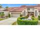 Attractive two-story home with tile roof and landscaped grounds at 3076 Braeloch E Cir # 5, Clearwater, FL 33761