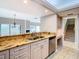 Kitchen features granite countertops and stainless steel appliances at 3076 Braeloch E Cir # 5, Clearwater, FL 33761