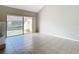 Open living area with access to private patio and water views at 3076 Braeloch E Cir # 5, Clearwater, FL 33761