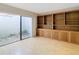 Bright office with built-in shelving and access to a private patio at 3076 Braeloch E Cir # 5, Clearwater, FL 33761