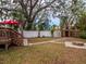 Large backyard with firepit, deck, and shed at 728 Bay St, Dunedin, FL 34698