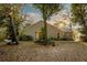 House with large backyard and mature trees in the background at 9402 Forest Hills Cir, Tampa, FL 33612