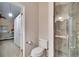 Guest bathroom with toilet and shower stall at 9402 Forest Hills Cir, Tampa, FL 33612