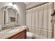 Bathroom with granite countertop and shower/tub at 9402 Forest Hills Cir, Tampa, FL 33612