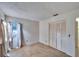 Bedroom with window, closet and carpet flooring at 9402 Forest Hills Cir, Tampa, FL 33612