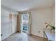 Spacious bedroom with window and closet at 9402 Forest Hills Cir, Tampa, FL 33612
